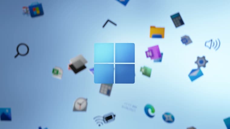 Windows 11 logo with app icons floating on the background