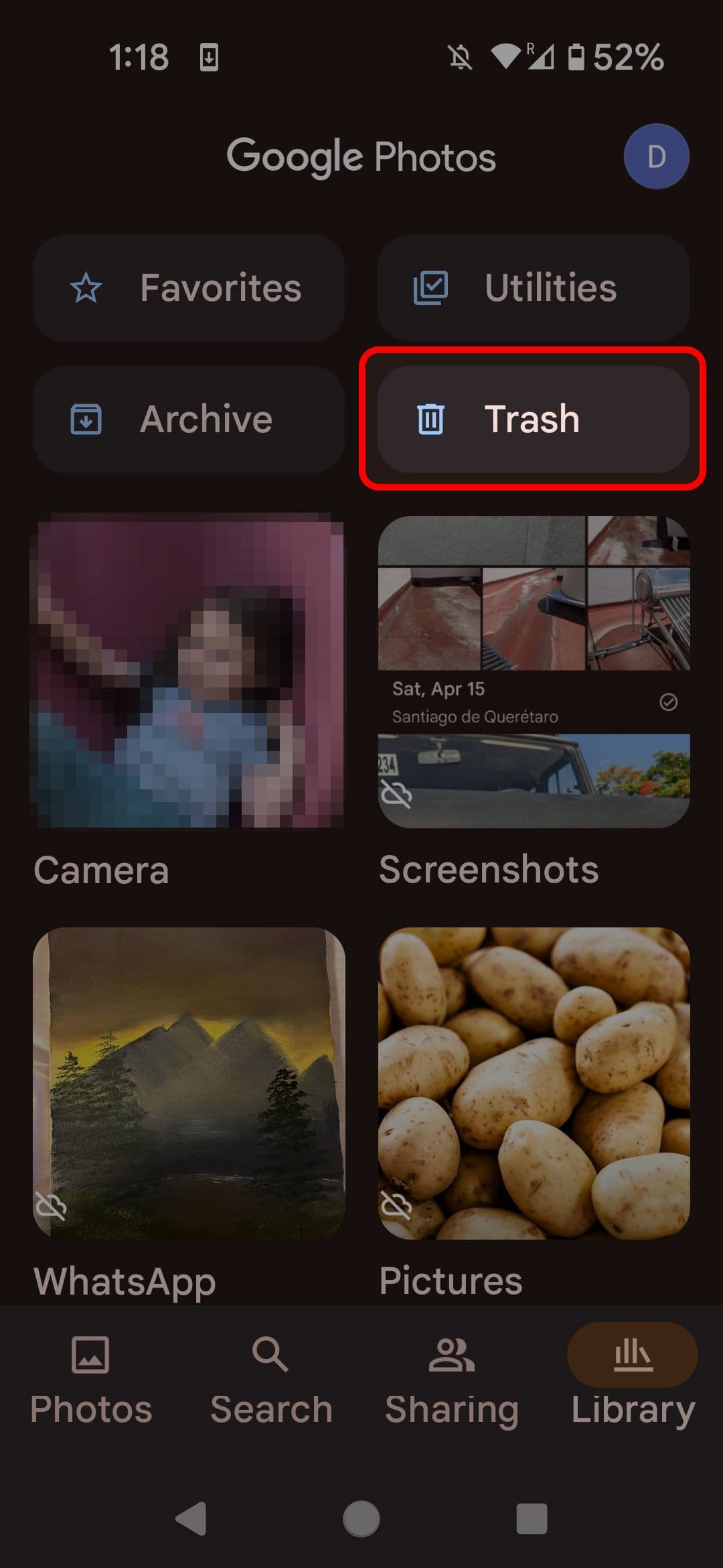 Google Photos Library page highlighting the Trash button