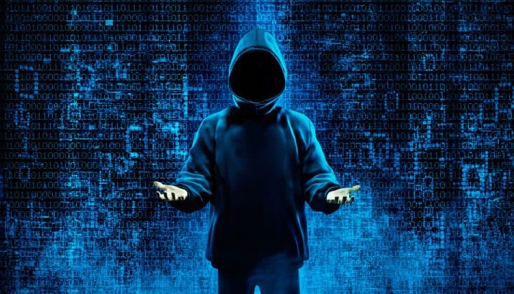 Hacker holding up hands