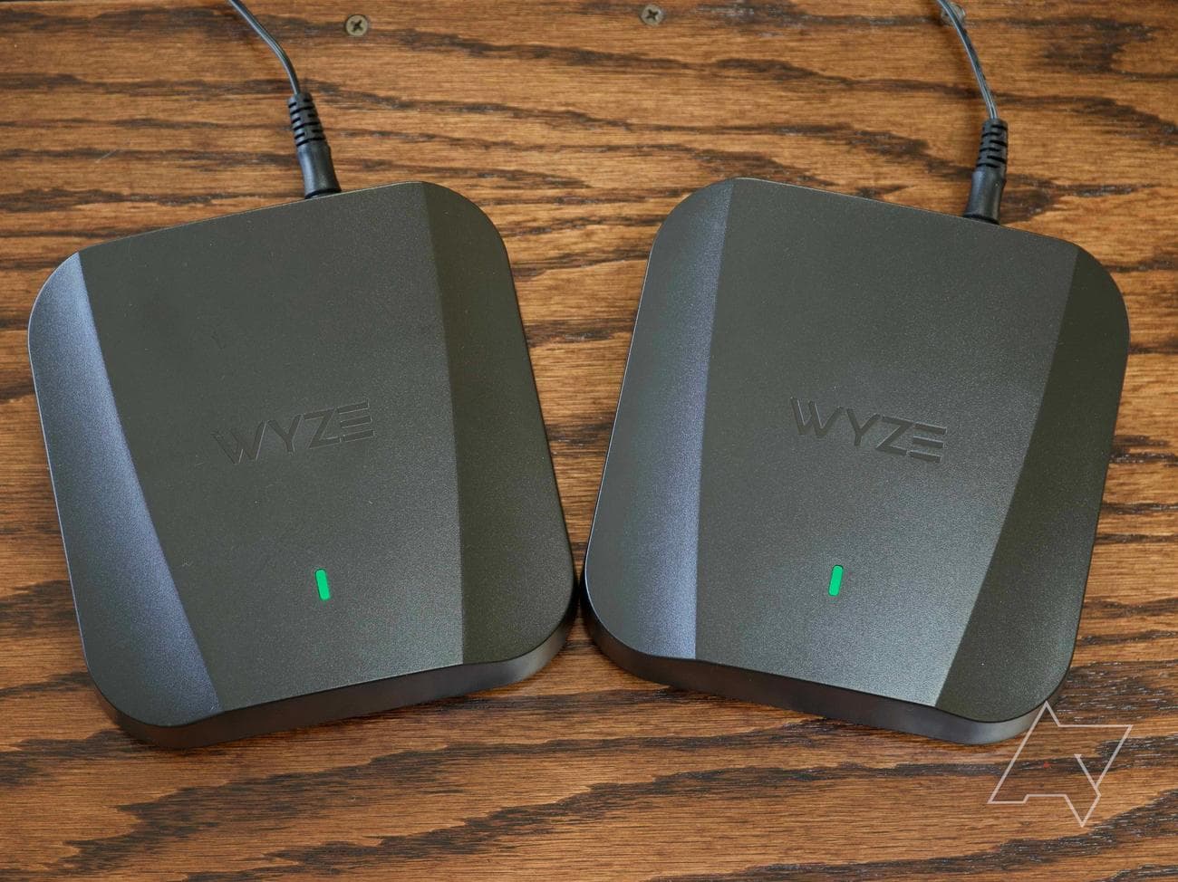 Wyze Mesh Router Pro with green status lights indicating a connected mesh