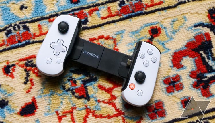 black and white controller resting on multicolored carpet
