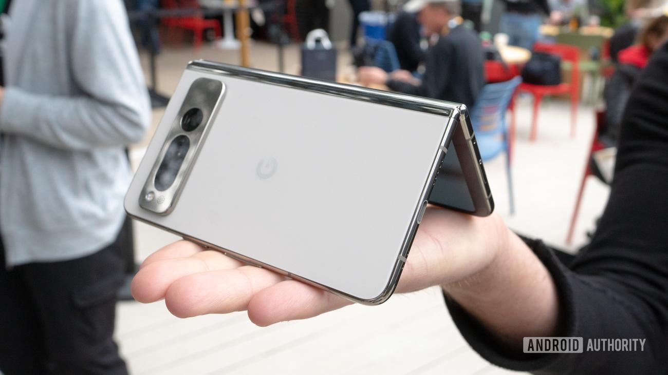 Google Pixel Fold half closed on palm 2