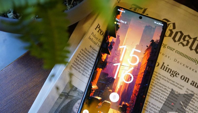 The Google Pixel 7 Pro sitting on top of a newspaper