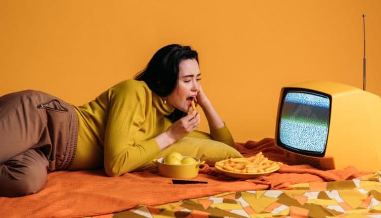 Image of a woman watching TV