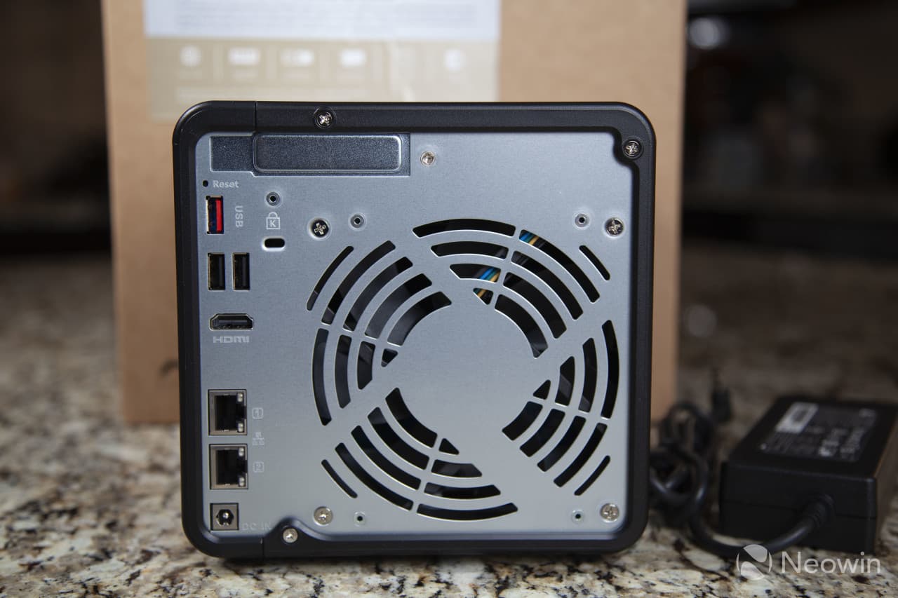 Picture of the back of the QNAP TS-464 showing two 25GbE ports HDMI three USB power and a Kensington