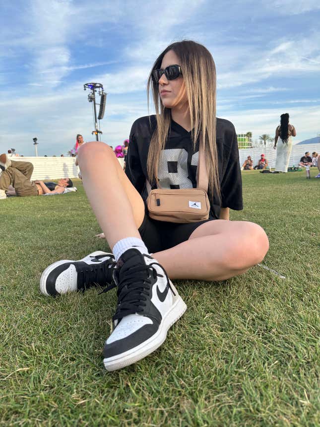 The Twitch streamer Rivers is seen sitting on the grass.