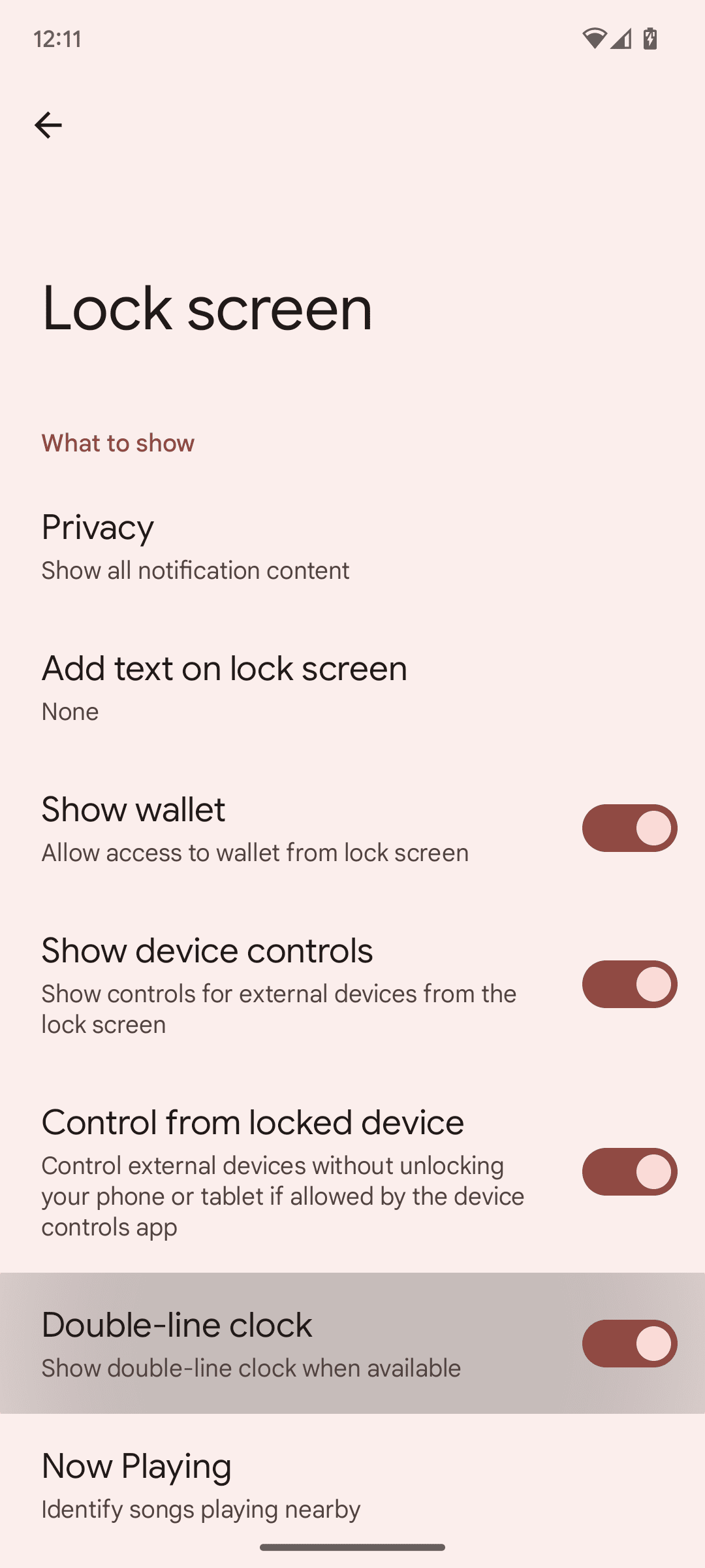 Screenshot of Android 13's lock screen options with double-line clock toggle highlighted