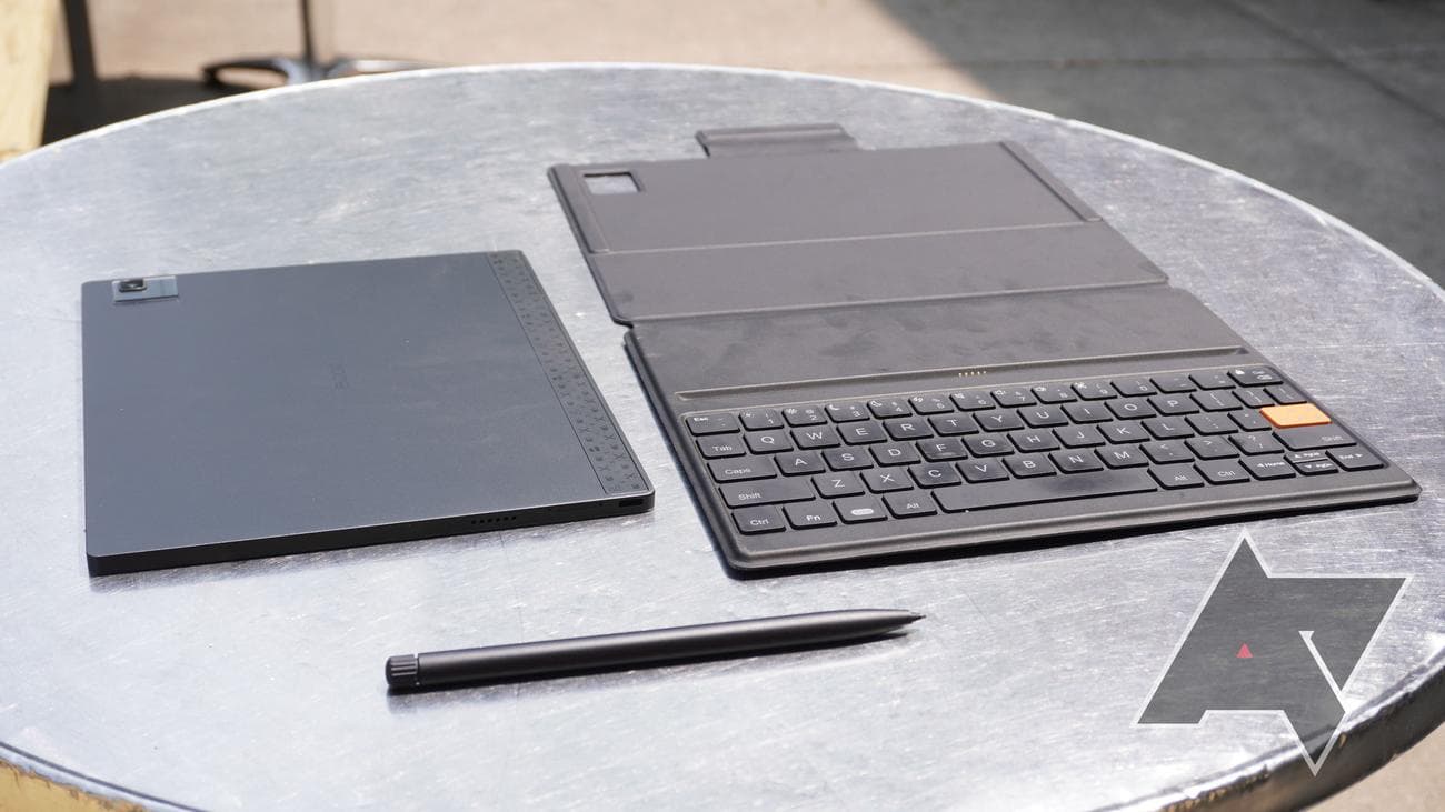 Onyx Boox Tab Ultra C with detached accessories on a tablet