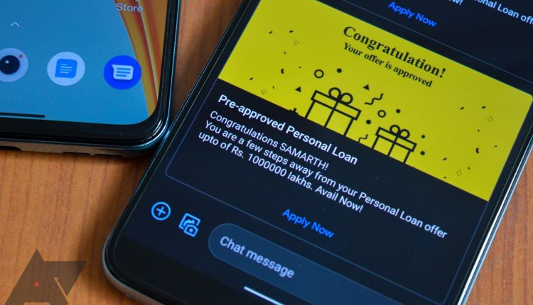 A spam messasge displays on a phone