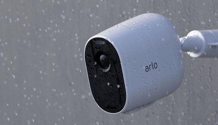 Arlo Essential Wireless Camera hanging up in the rain
