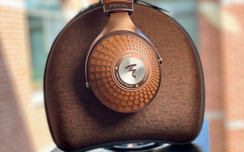 Focal Stellia hanging on case on top of Naim Atom Uniti