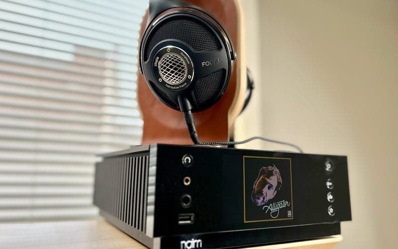 Focal Utopia on Grovemade headphone stand atop NAIM Atom