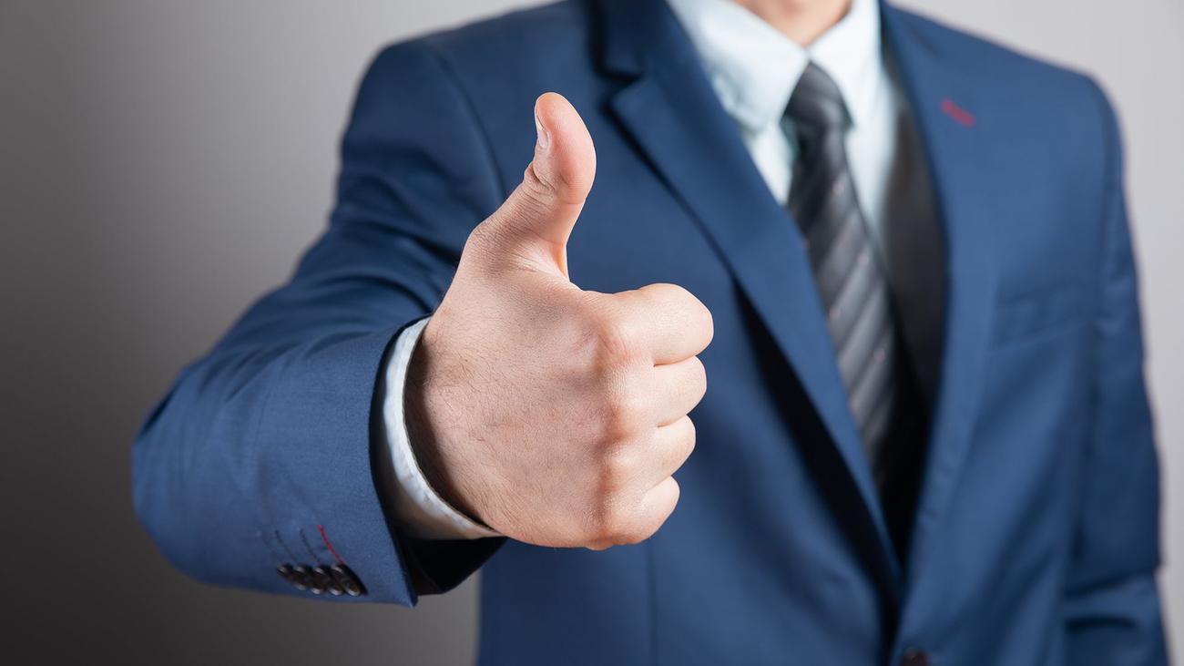 young man with hands shows a good sign