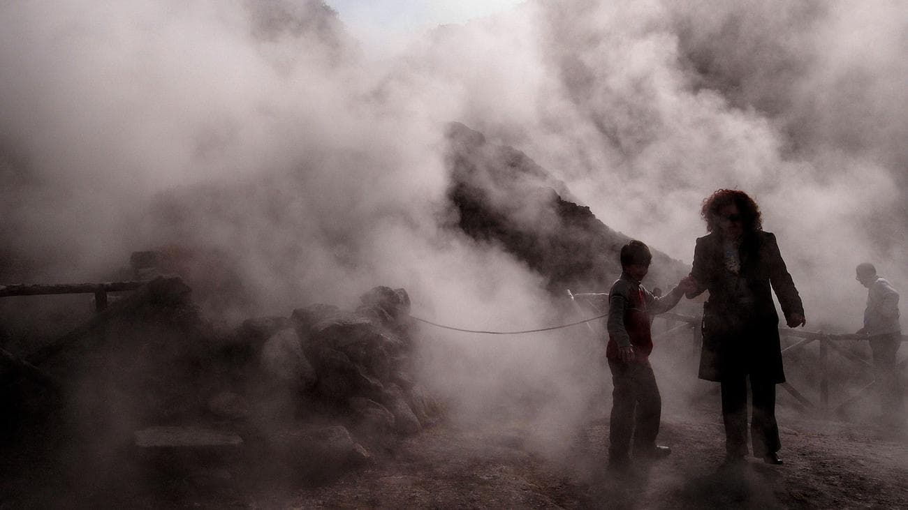 Tourists visit the Solfatara crater, part of the Campi Flegrei Volcano, the biggest caldera of Italy.
