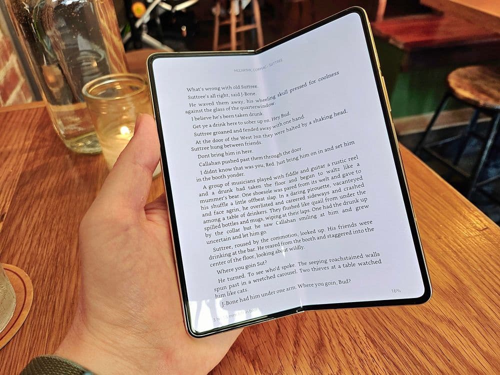 someone reading on the samsung galaxy z fold 5