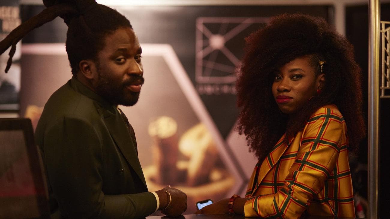 Kwabena (Adjani Salmon) and Amy (Dani Moseley) stand together in the show "Dreaming Whilst Black"