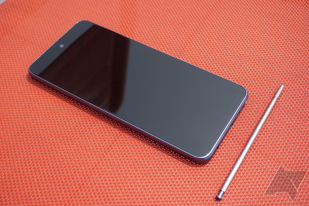 The front of the Moto G Stylus with the stylus next to it.
