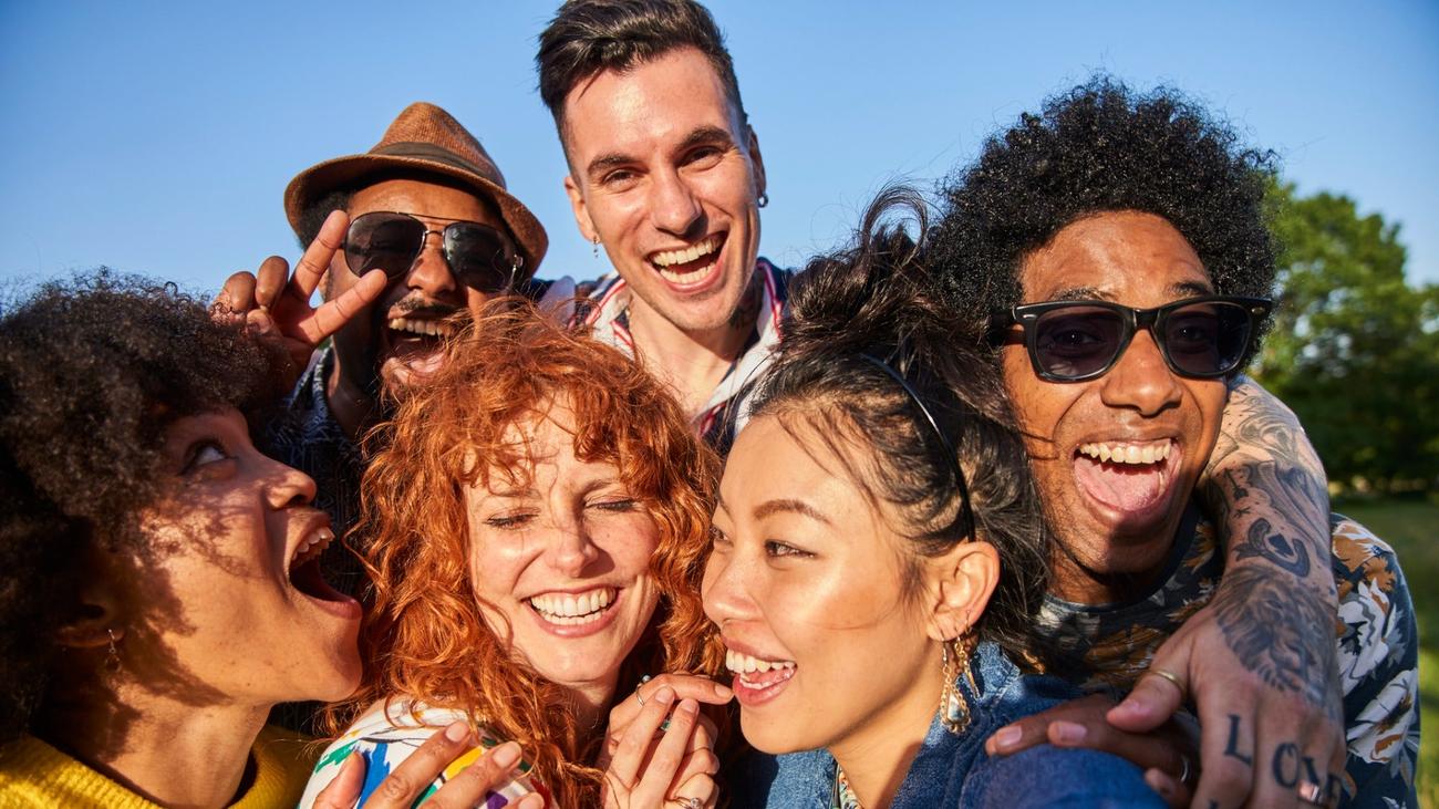 Group of friends laughing.