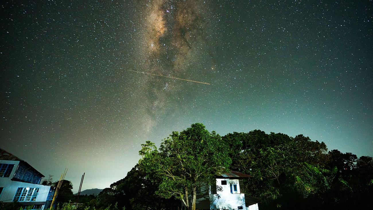 A flight-illuminated path and milky way were seen in the sky on August 14, 2023, in Ratnapura, Sri Lanka. 