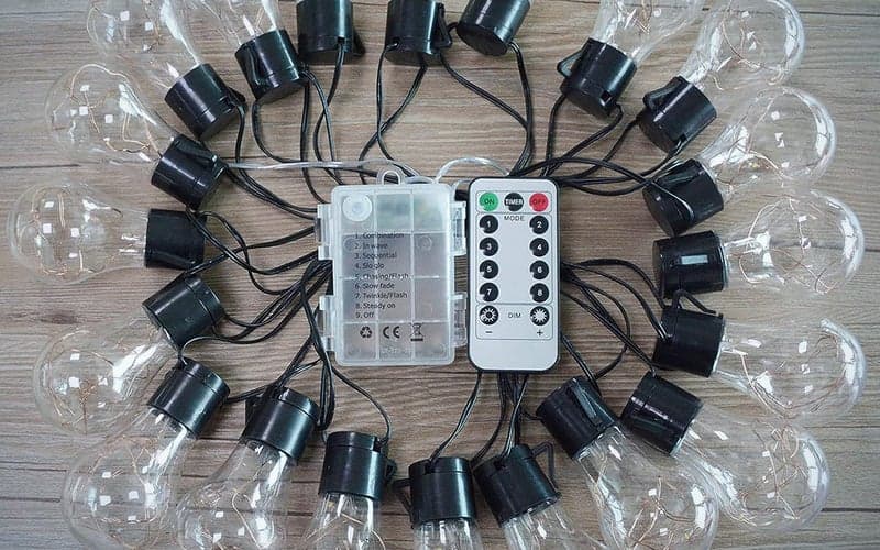 The Janchs string lights on the ground