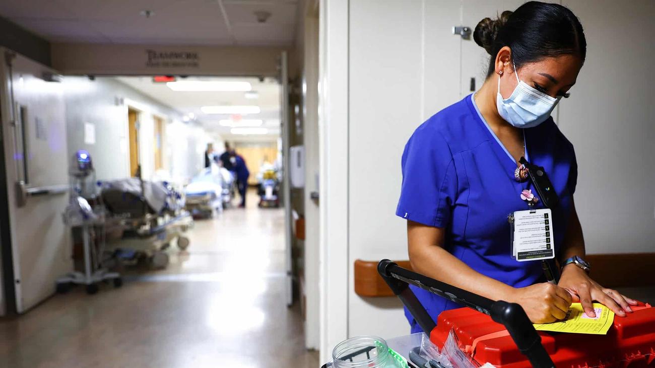 Lab technician Alejandra Sanchez works at Providence St. Mary Medical Center on March 11, 2022, in Apple Valley, California.