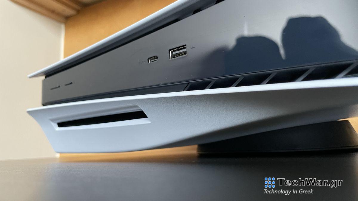 The front of a PS5 console showing the disc tray