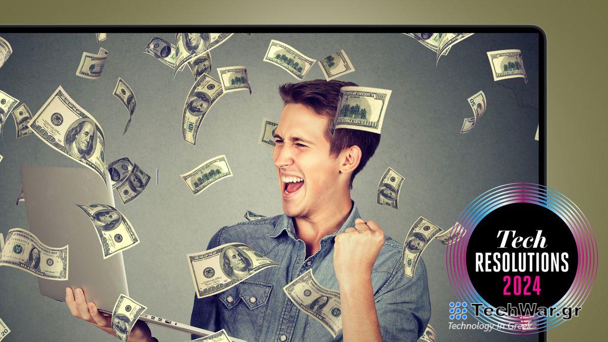 A happy man making money on his laptop