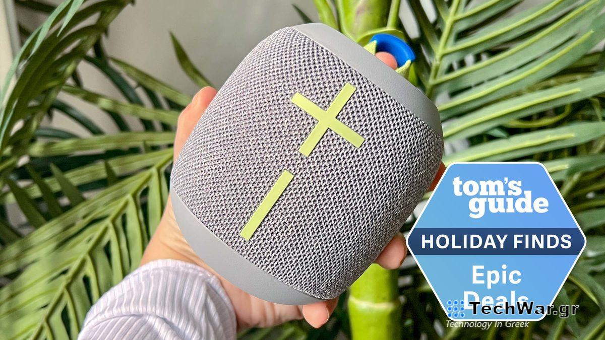 Ultimate Ears Wonderboom 3 Bt speaker held against a green backdrop and tagged with Epic Deals badge