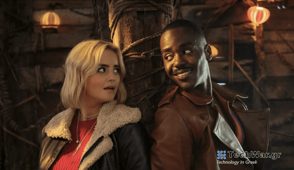 New Doctor Ncuti Gatwa and his new companion Ruby (Millie Gibson) pose back to back for the Doctor Who Holiday Special — The Church on Ruby Road