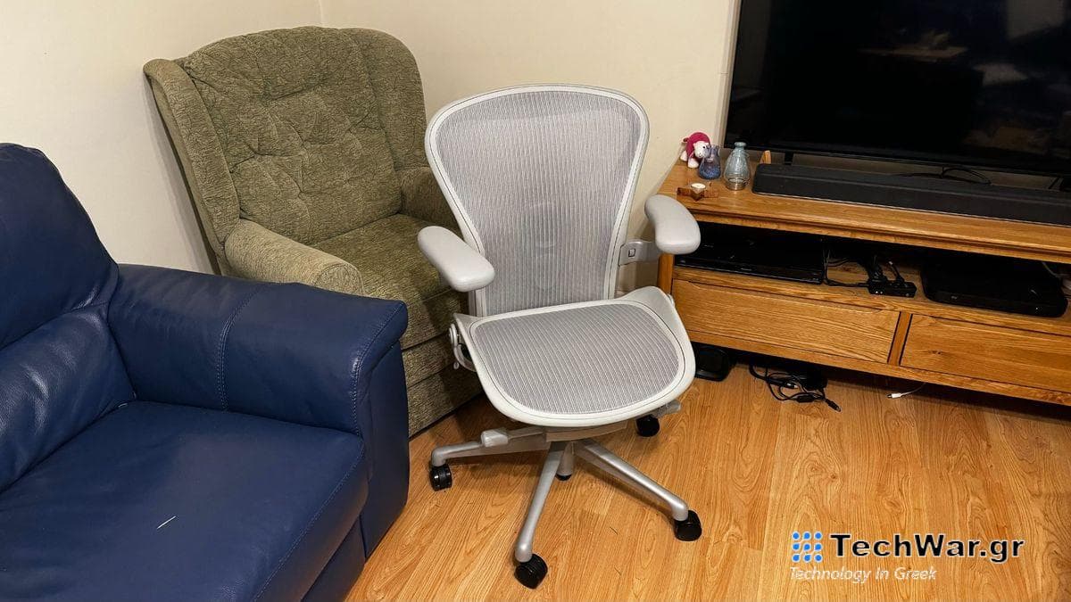 Herman Miller Aeron in front of a sofa