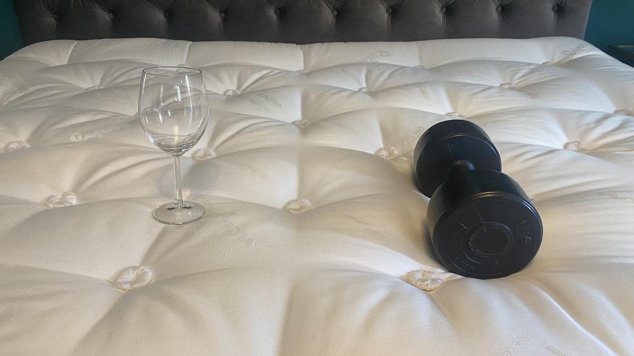 Relyon Bridgwater Dunlopillo Latex Mattress review image shows a motion isolation test in action