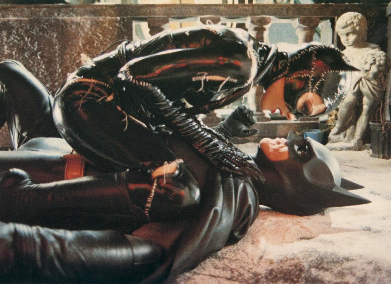 Catwoman straddles Batman in "Batman Returns."