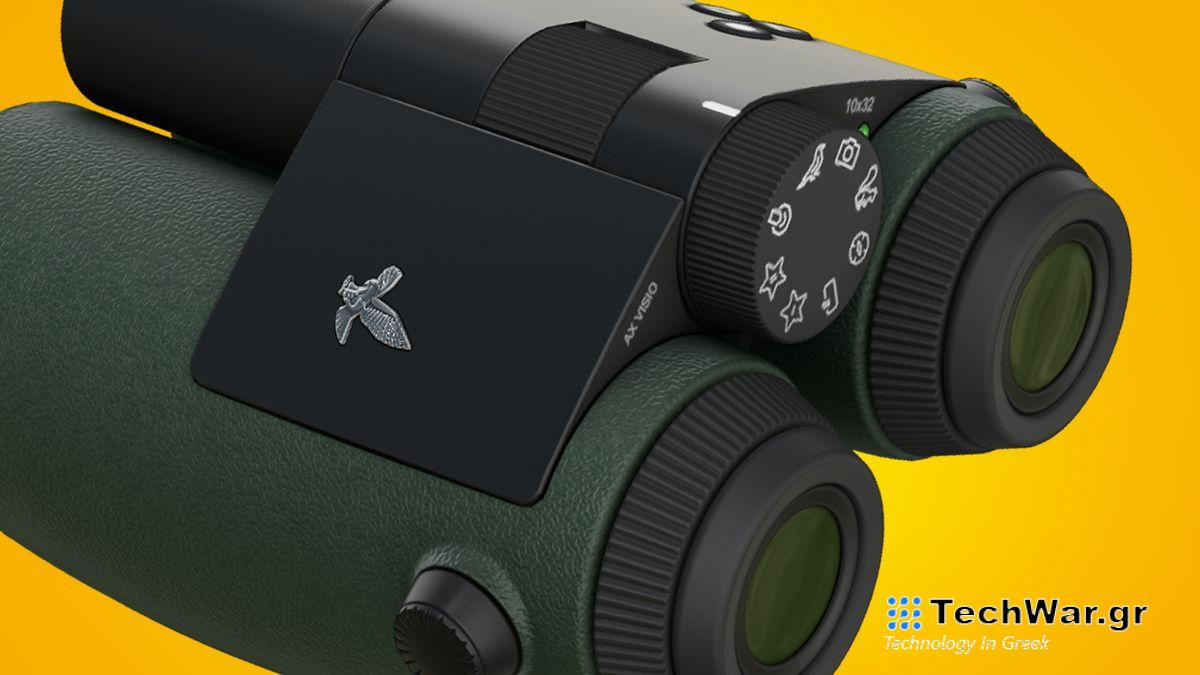 A pair of Swarovski binoculars on an orange background