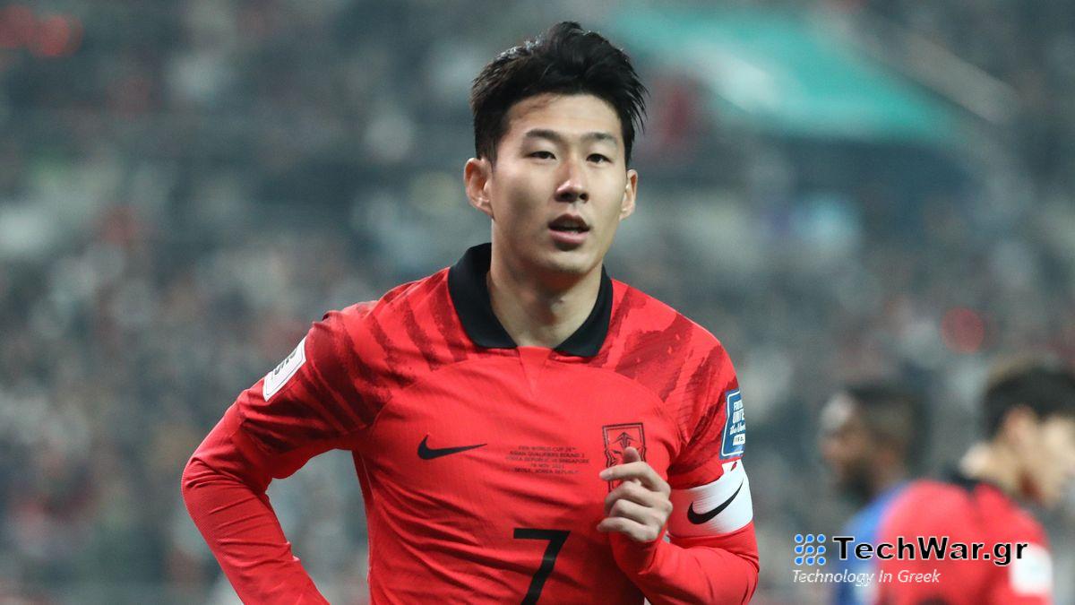 Son Heung-min, wearing a red and black South Korea soccer shirt, warms up for the AFC Asian Cup in Qatar.
