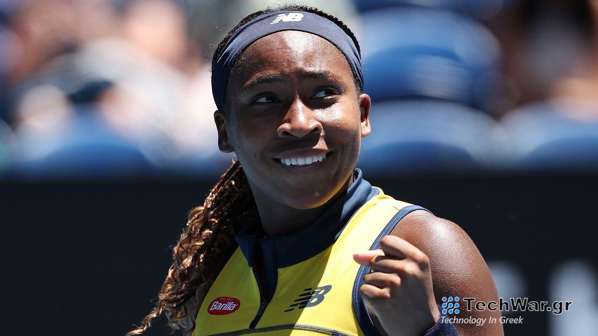 Coco Gauff of the United States, wearing yellow tennis kit, clenches her fist prior to the Dolehide vs Gauff live stream