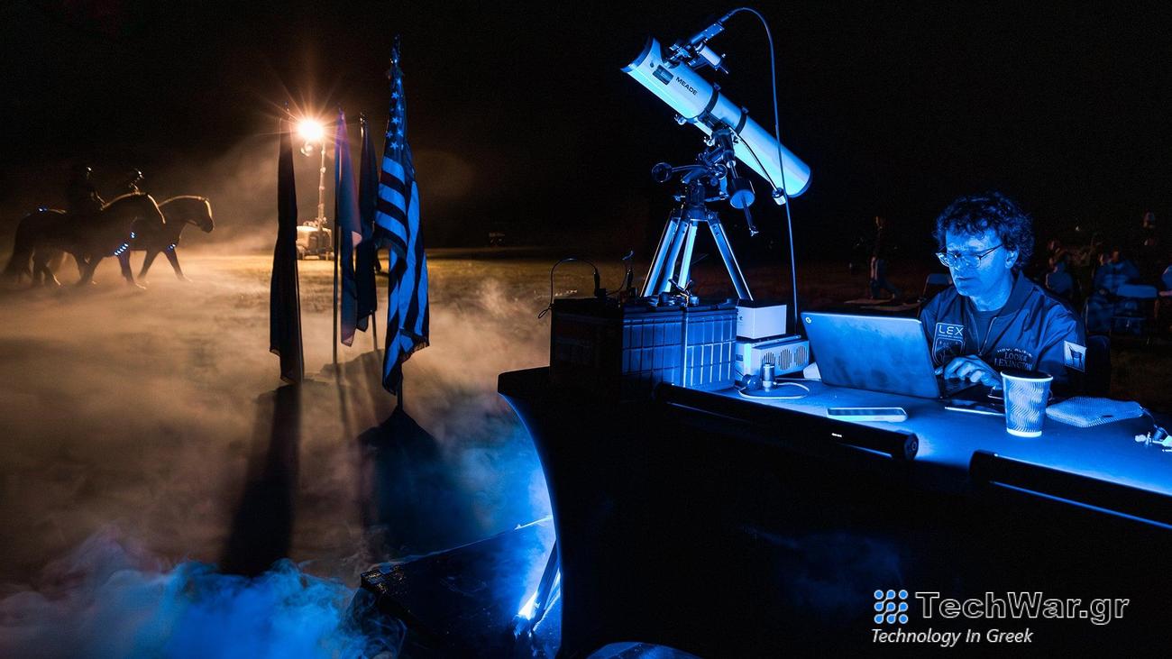 Robert Lodder sends Lexington tourism data ad into space at evening launch event with horses in background