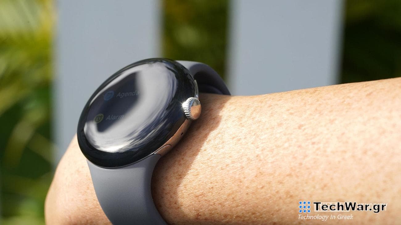 A Google Pixel Watch on a user's wrist highlights the digital crown.