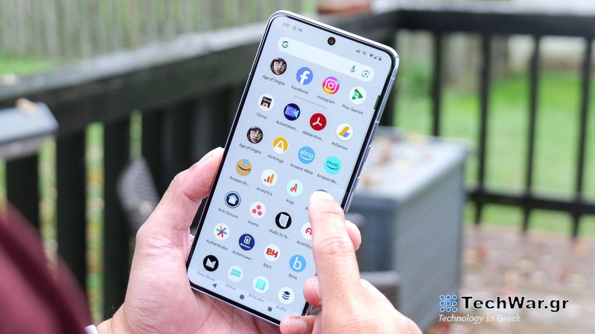 Google Pixel 8 Pro held in hand.