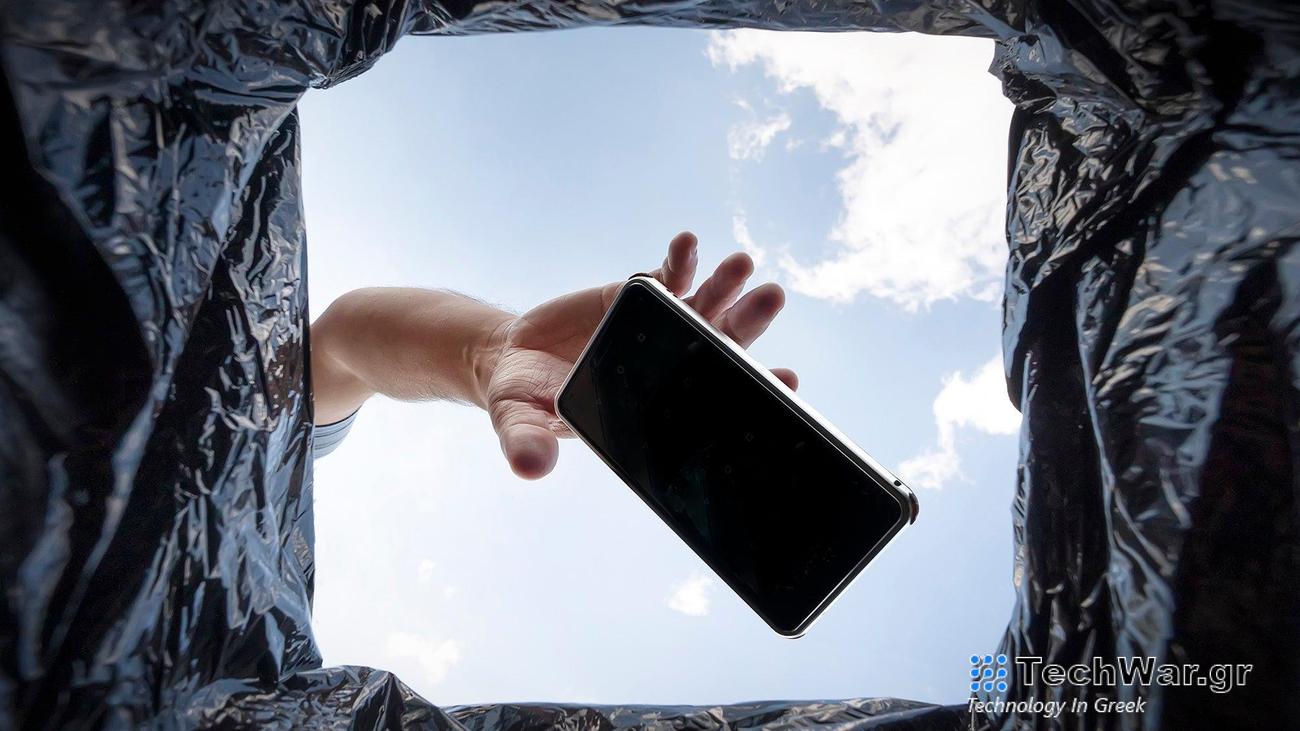 a phone being throw into the trash