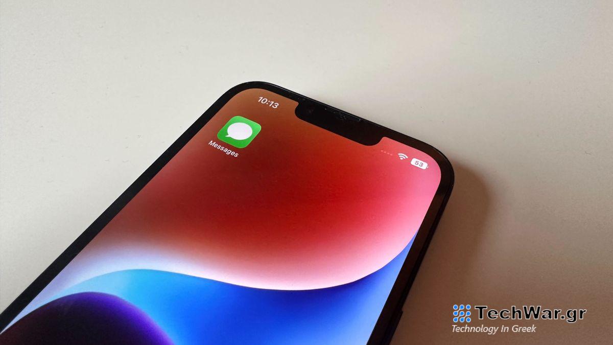 iPhone 14 with Messages app on home screen