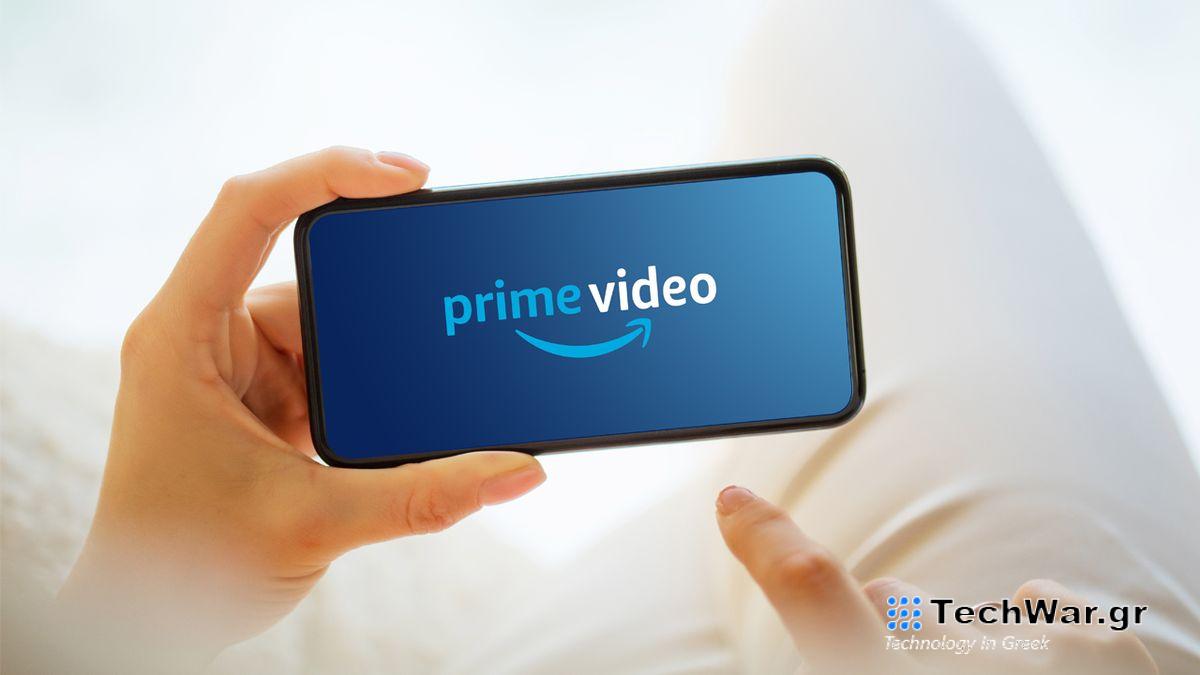Amazon Prime Video logo on a phone being held by someone
