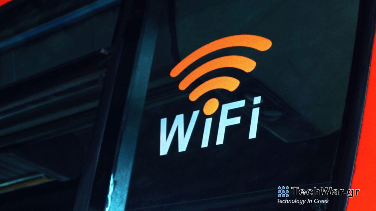 A bus with a WiFi sign on the back