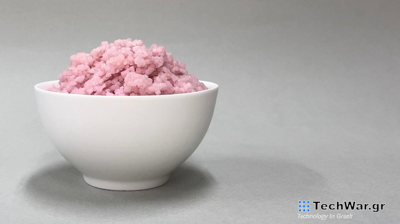 Pink lab-grown beef rice in white bowl
