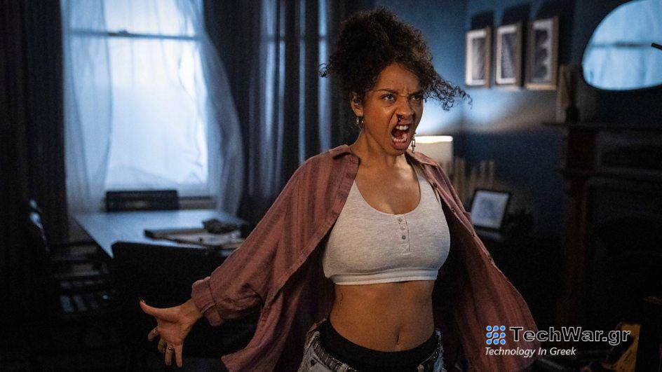 Sienna Kelly as modern witch Domino Kelly, baring her bloodstained teeth as she prepared to feed