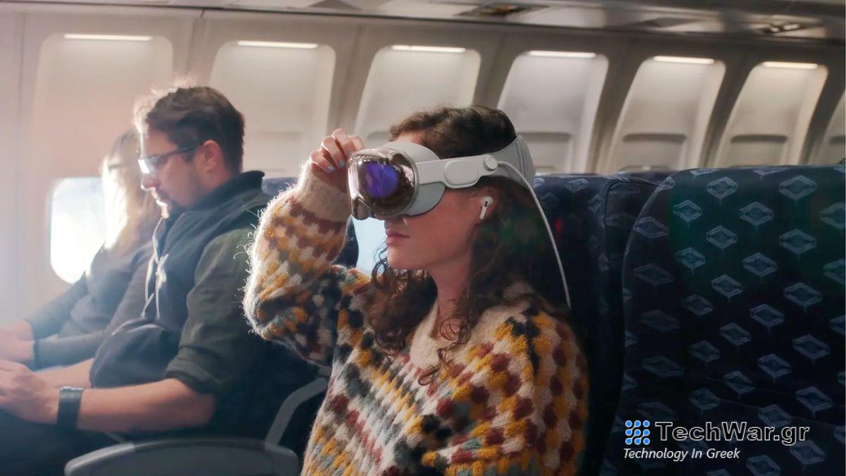 woman using apple vision pro on a plane