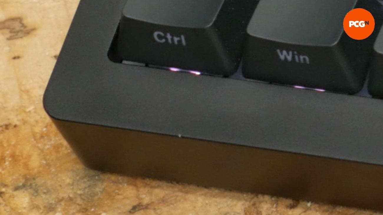 Monsgeek M1W SP review image showing a close up of chipped paint beneath the CTRL button.