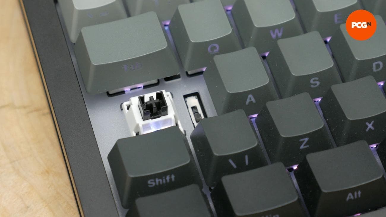 Monsgeek M1W SP review image showing a close up of the wireless switch.