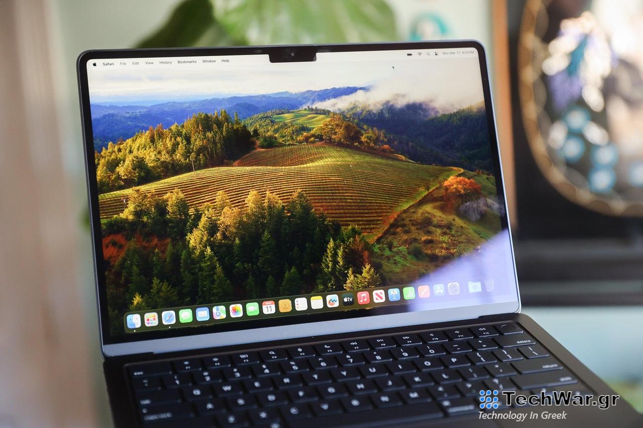 The MacBook Air M3 on its homescreen with a blurry background