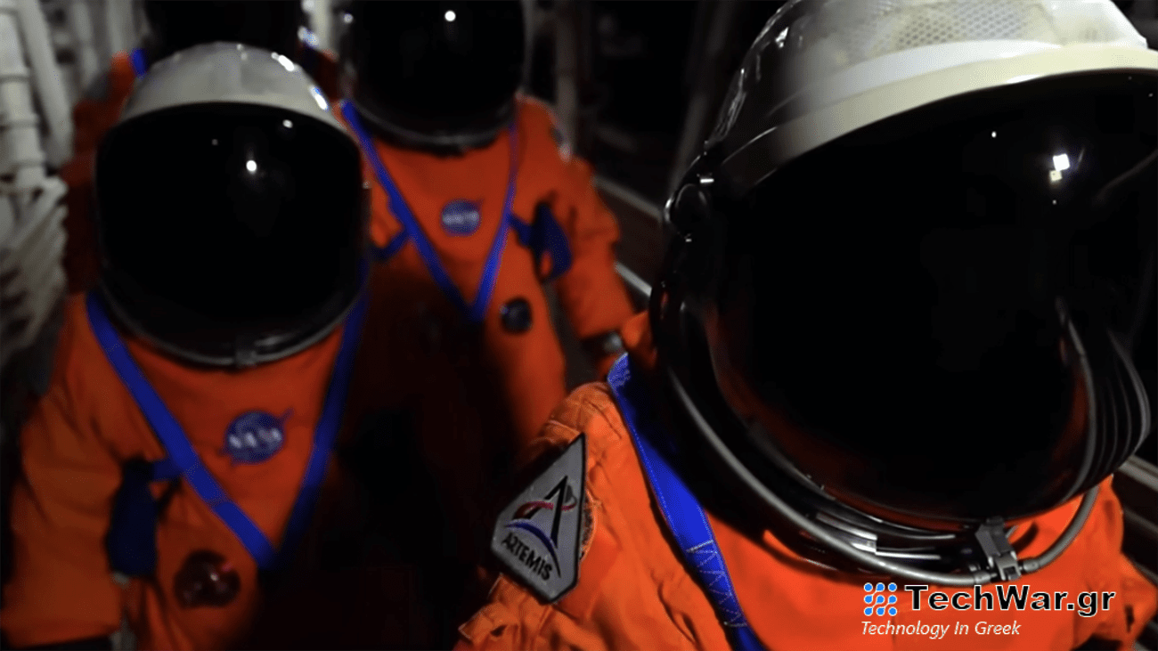 Close-up of three Artemis astronaut suits