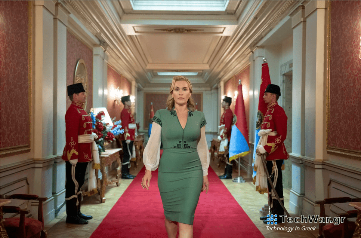Kate Winslet, as autocratic ruler Chancellor Elena Vernham, walking down a corridor in her palace/HQ with soldiers on either side